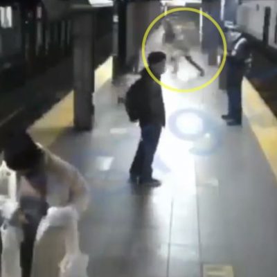 Video shared online Thursday, Nov. 19, 2020, shows the horrifying moment when a disturbed man shoved a woman onto a set of Manhattan subway tracks and directly in front of an incoming train. (Obtained by Daily News)